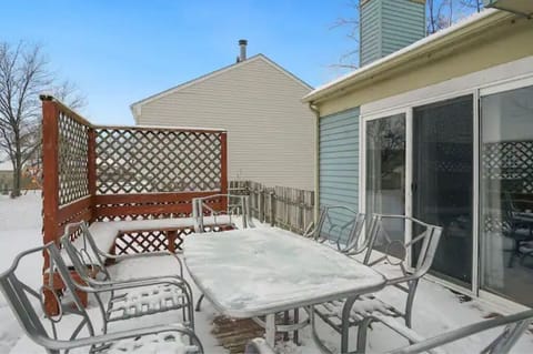 Backyard patio/deck includes a 6-seat patio plus built-in nook seating.