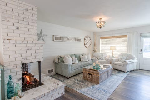 The pair of armchairs have been positioned in the window to make the most of Cannon Beach's beautiful afternoon light. There's no greater place to relax with a good book after a fun day out.