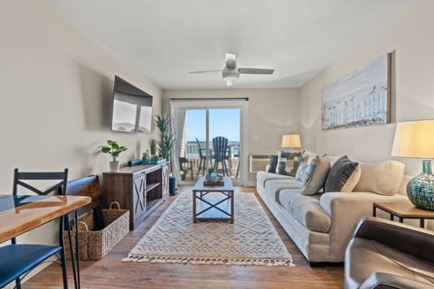 The ocean front living room is well-appointed with comfortable furnishings.