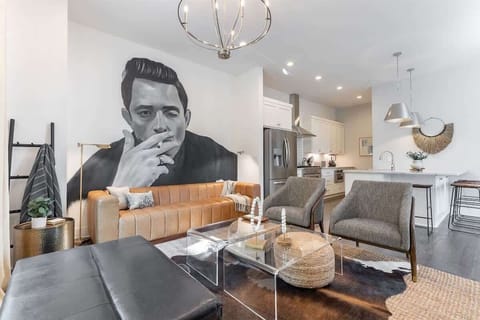 Feel the rhythm—Johnny Cash wall art anchors the living room ambiance.