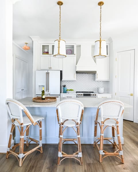 Kitchen has an eat at counter.