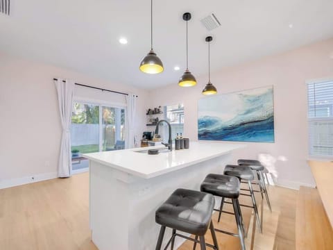 Convene around the island table and chat the day away