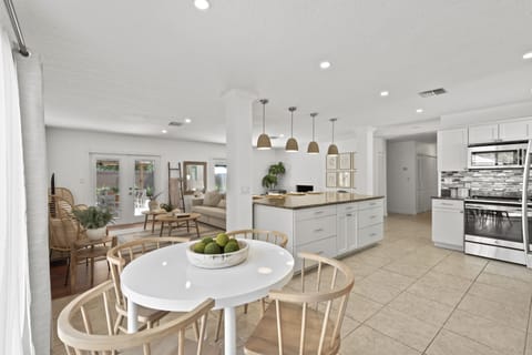 With the spacious kitchen and dining area, there is plenty seating for 8 guests.