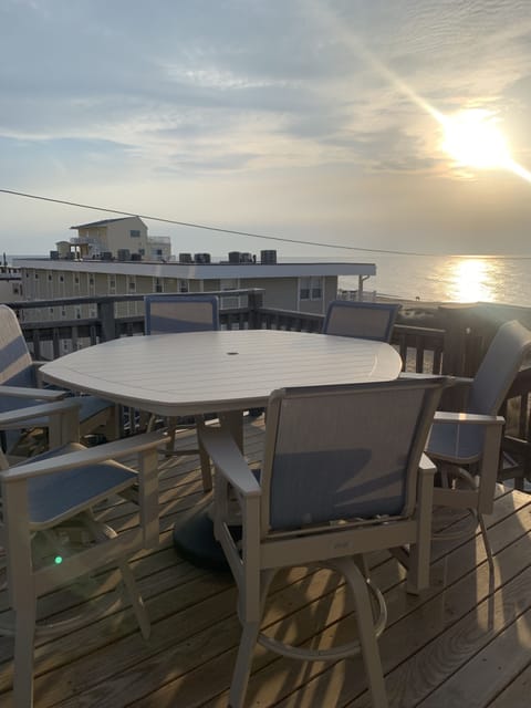 Sunrise over the ocean from the deck