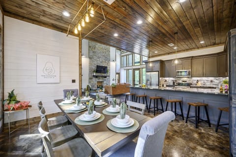 "Gather around - our kitchen table and island seating accommodate the whole crew."