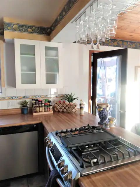 The kitchen is open to the dining room