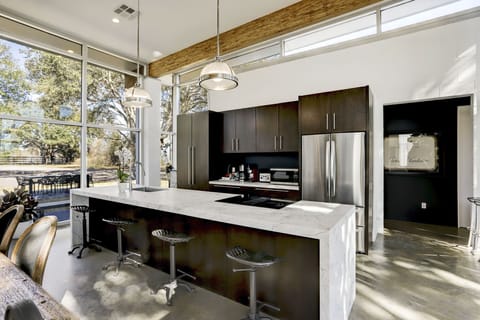 Huge island kitchen with bar