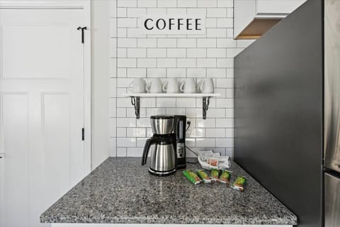 Grab your morning hot beverage from the coffee station, fully outfitted with all the supplies you need – snacks, too!