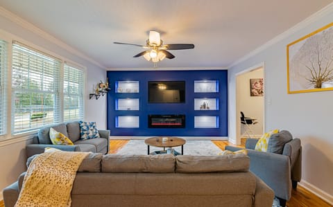 Gather together for a cozy evening with a fireplace and a smart TV. Family fun and relaxation starts here. 