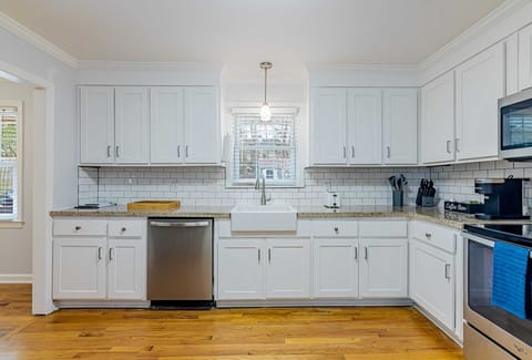 Modern appliances, cookware and barware included!