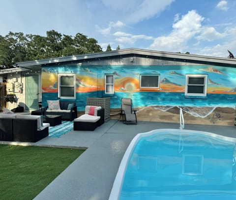 Enjoy the feeling of being on the beach, in your private pool and yard.