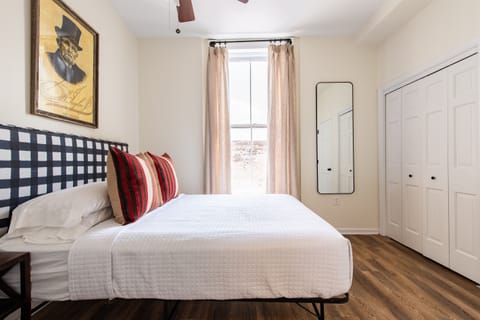 EH Taylor Bedroom Ensuite Full Bath King size bed 45" smart tv white noise machine