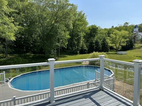 Primary bedroom balcony overlooking the pool