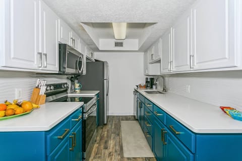 Fully updated kitchen with quartz countertops and new backsplash