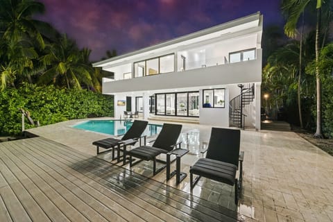 Relax and unwind on the spacious pool deck under the stars