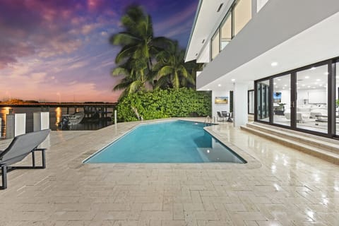 Enjoy breathtaking twilight views from your exclusive villa pool