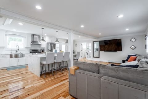 The home features bright, open-concept living with contemporary design