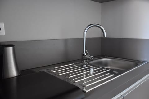 The kitchenette is equipped with everything you need to prepare yourself a tasty snack. 