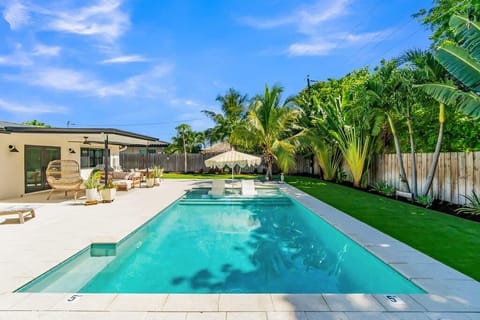 Relax and unwind in the heated saltwater pool with sun loungers