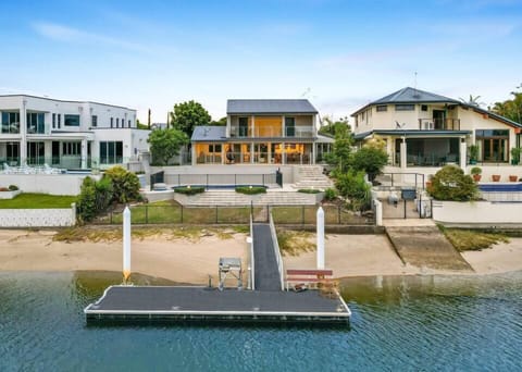 Private pontoon adds direct waterfront access near the pool and alfresco spaces.
