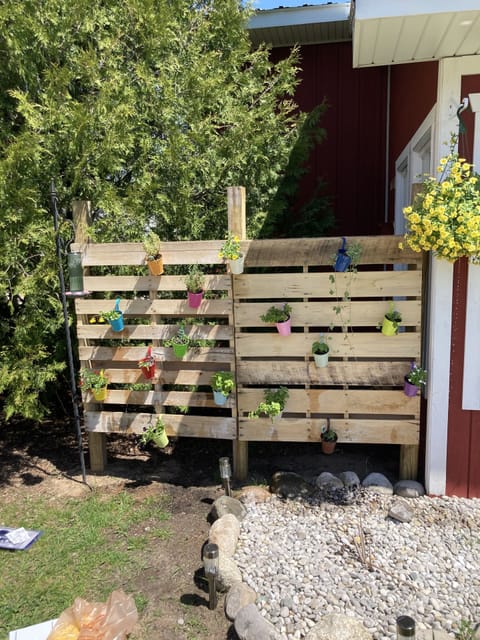 Mini vertical herb garden for guests to get fresh herbs!