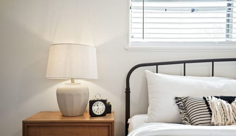 King bedroom with luxury quality hotel linens and walk in closet