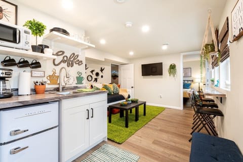 Lower level Coffee Bar/Kitchenette (NO STOVE) & common space