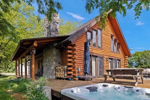 Relax on Scout’s Haven’s outside deck, complete with an in-ground hot tub.