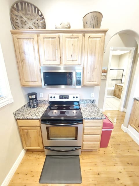 Full-sized, stainless-steel appliances in the kitchen & comes fully stocked!