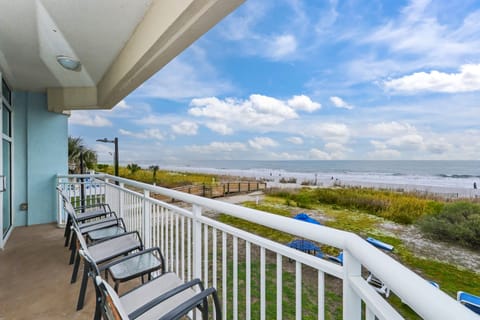 Oceanfront Balcony View: Sip morning coffee with stunning beach views from your own private retreat!