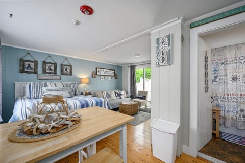 Queen size bed in open living area - 200 Captain Chase Road Dennis Port