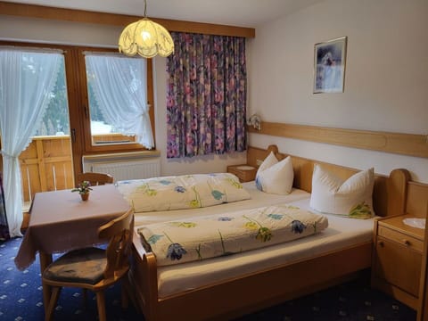 Furniture, Property, Comfort, Window, Curtain, Wood, Interior Design, Floor, Bed Frame, Pillow