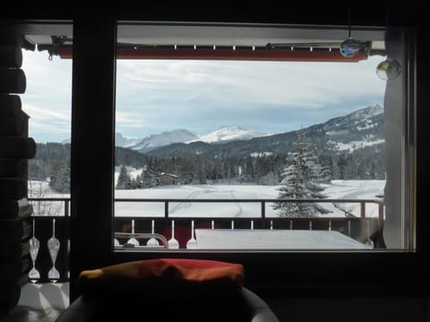 Sky, Property, Building, Window, Table, Cloud, Mountain, Architecture, Snow, Tree
