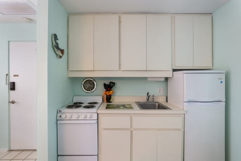 Kitchen with stove & oven. Great for dining in!
