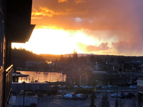 View of the summer sunsets & Riverstone Lake from the private balcony.