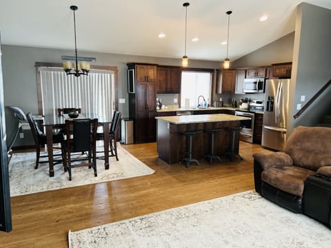 Kitchen and dinning room facing from ground level living room.