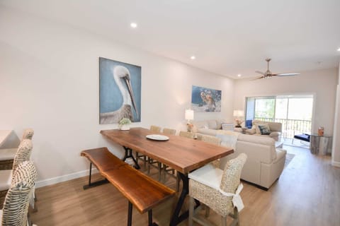 Large, live-edge dining room table with chairs and bench