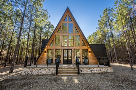 "Step into a world of rustic warmth and modern elegance, welcomed by inviting double doors."