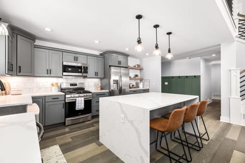 Kitchen stocked with everything you need. Wine glasses, blender, wine opener, zester, utensils of all kinds, kids plates/bowls/silverware, griddle, toaster you name it we probably have it!