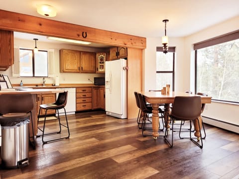 Fully equipped kitchen with seating for 8.