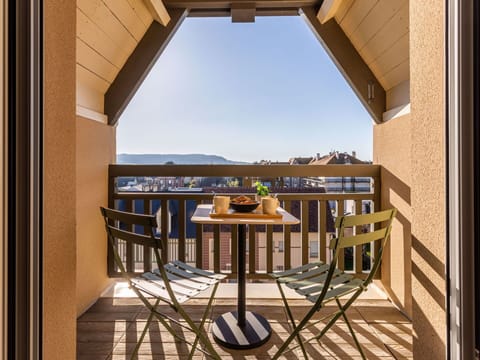 Sky, Wood, Building, Shade, Fence, Landscape, Facade, Roof, Slope, Siding