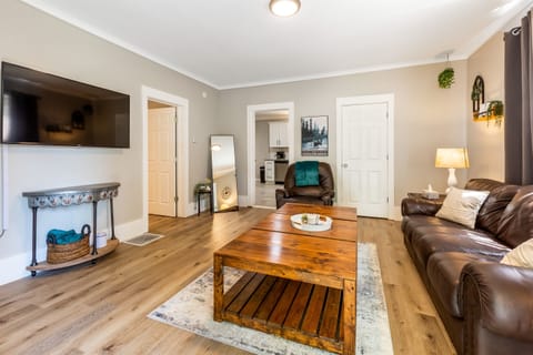 A living room that's perfect for relaxing, watching movies, and spending time with loved ones.