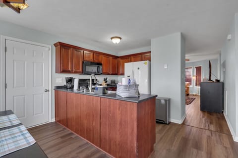 Fully stocked kitchen with spices, cookware, plates, cups, bowls, fridge, stove, microwave etc. Everything you need for a fancy meal or simple food prep. Coffee pot included! Trust us to handle all of your lodging stress.