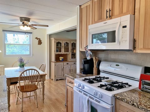 Kitchen is adjacent to the dining area