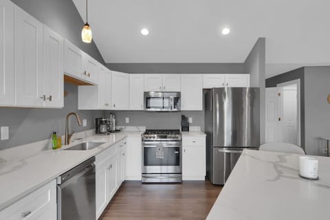 Stainless steel appliances throughout the kitchen