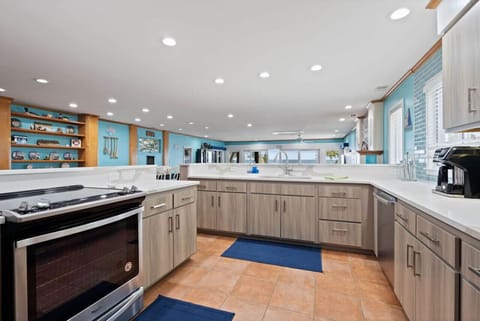 Open concept kitchen fully equipped with all your cooking basics and more!