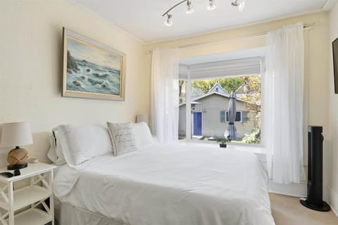 the large master bedroom has a comfy queen bed with microfiber bedding.