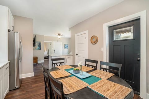 Downstairs unit fully stocked kitchen with seating for 6 at kitchen table, and an additional two at breakfast bar.