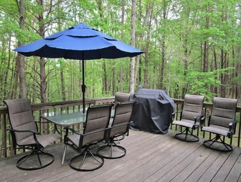 A 12x16 deck raised 14' off the ground provides beautiful views of the woods