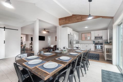 Gather with friends or family to enjoy a meal around the table! (Seats 12)